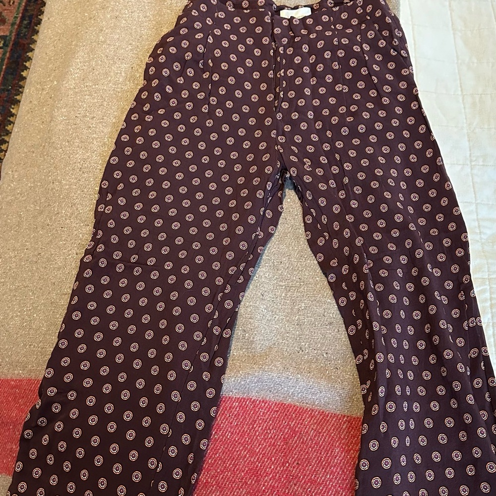 Red patterned anthro pants